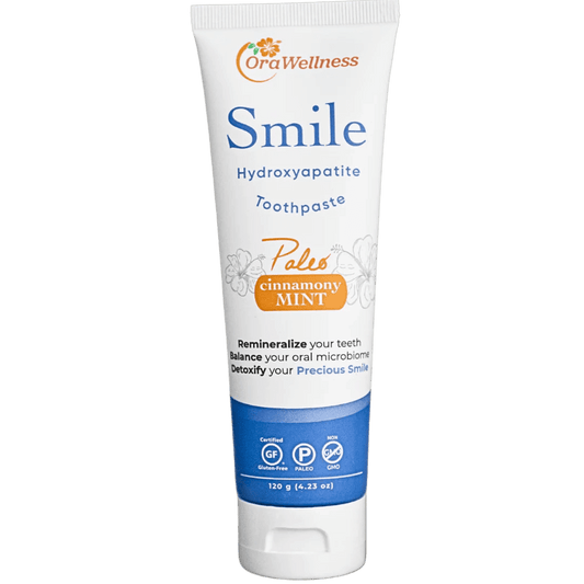 OraWellness Smile toothpaste tube on a white background