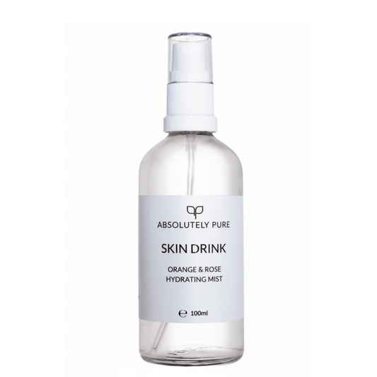 Absolutely Pure brand Skin Drink Orange & Rose Hydrating Mist in a clear 100ml bottle with white pump sprayer and label.